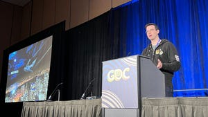 Senior programming director Doug Sheehan at GDC podium